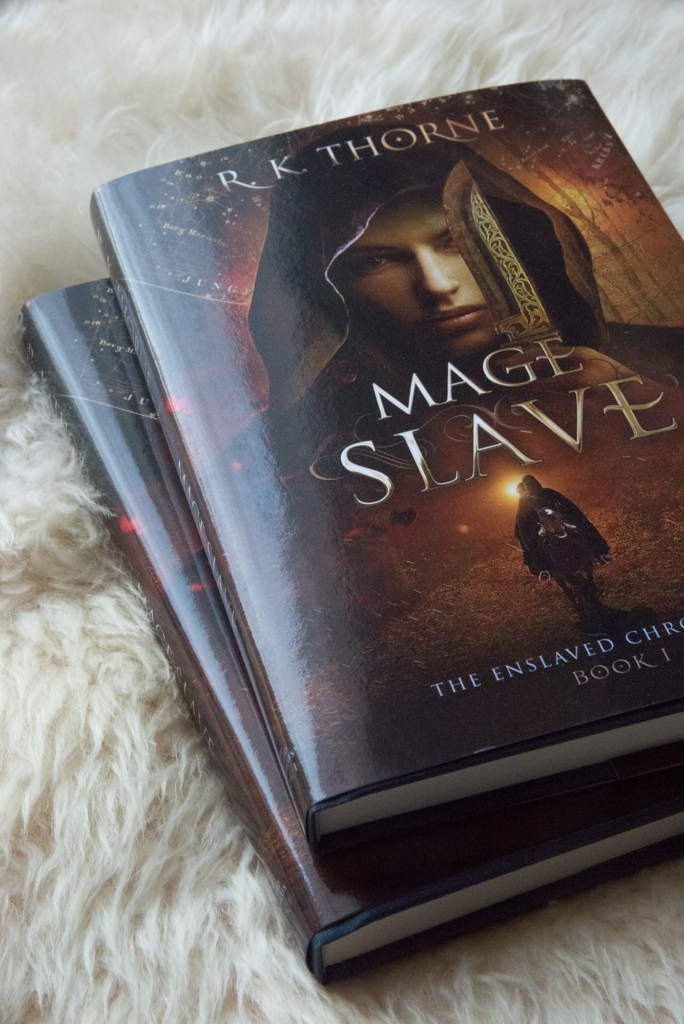 Mage Slave Hardbacks on a faux fur background