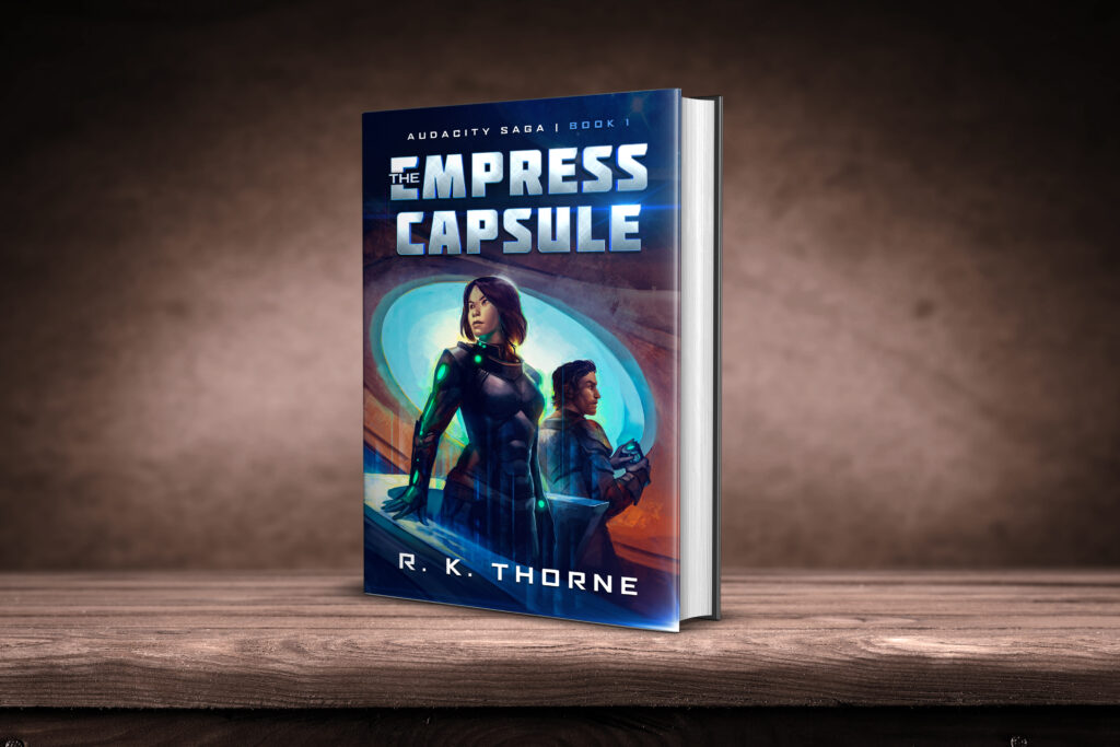 The Empress Capsule Hardback cover on wood table brown background